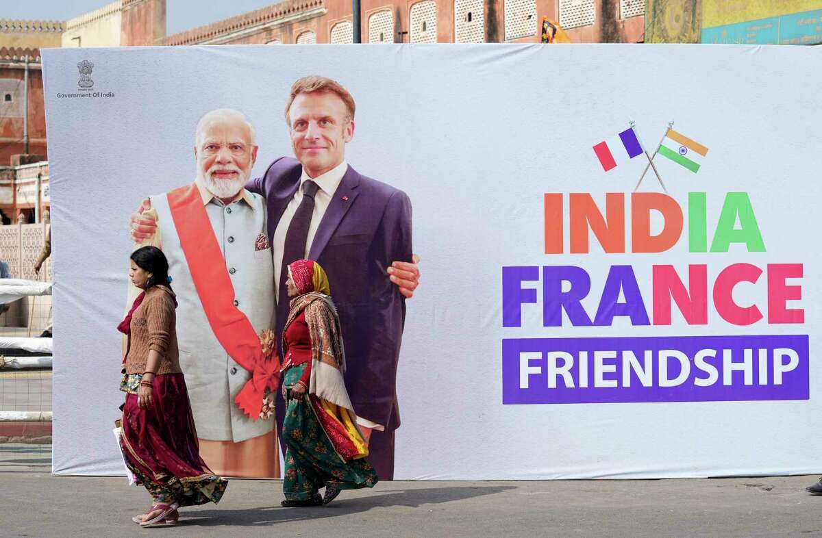 French President Emmanuel Macron Arrives In India For Republic Day Celebrations