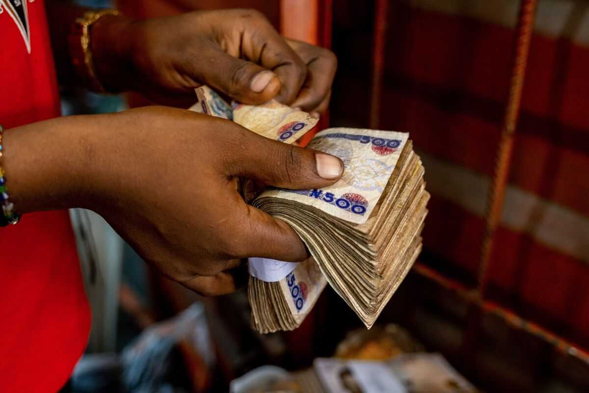 Nigeria's Naira Plunges To Record Low Against The Dollar Amid Currency Devaluation