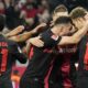 Bayer Leverkusen Secure Top Spot With Controversy Amid Bundesliga Chaos