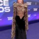 Laverne Cox Dazzles On People's Choice Awards Red Carpet In Jaw Dropping Chainlink Skirt Ensemble