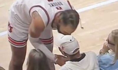 Morgan Freeman Grabs Auburn Player's Jersey At Basketball Game