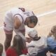 Morgan Freeman Grabs Auburn Player's Jersey At Basketball Game