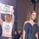 Animal Rights Activists Interrupt Victoria Beckham's Fashion Show At Paris Fashion Week