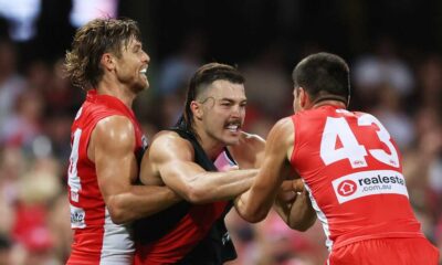 Cloke's Controversial Intervention: Swans Clash With Essendon Heats Up