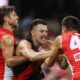 Cloke's Controversial Intervention: Swans Clash With Essendon Heats Up