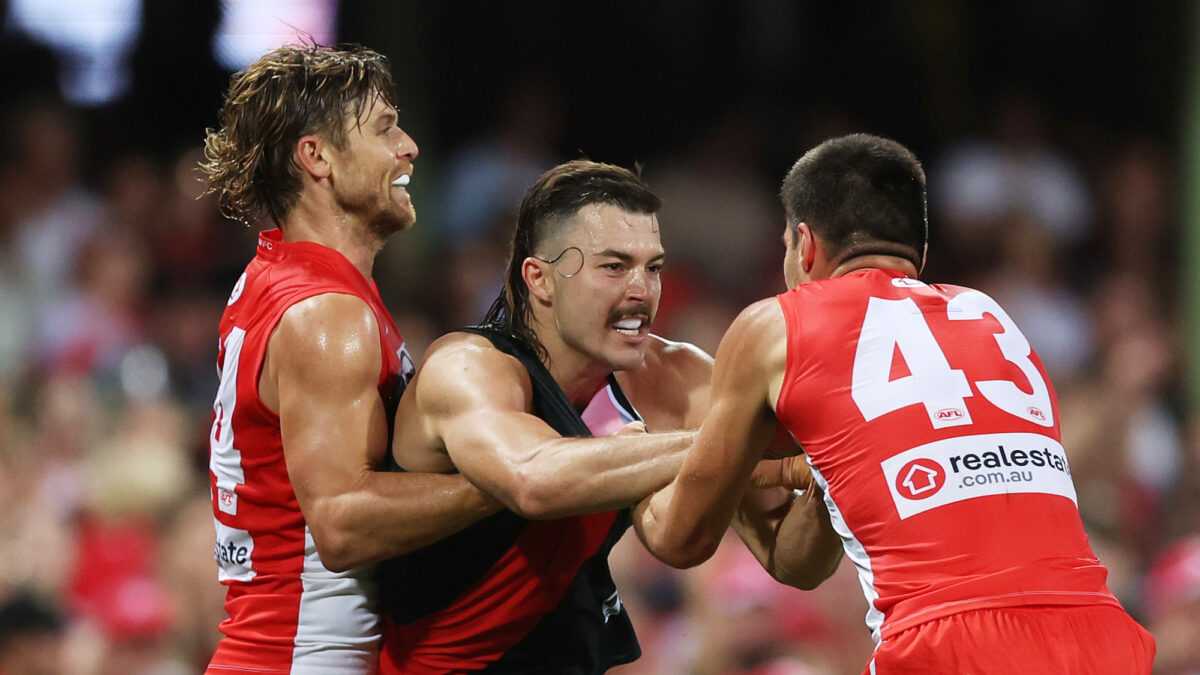 Cloke's Controversial Intervention: Swans Clash With Essendon Heats Up