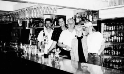 Bartender Serving Drinks In A University Pub