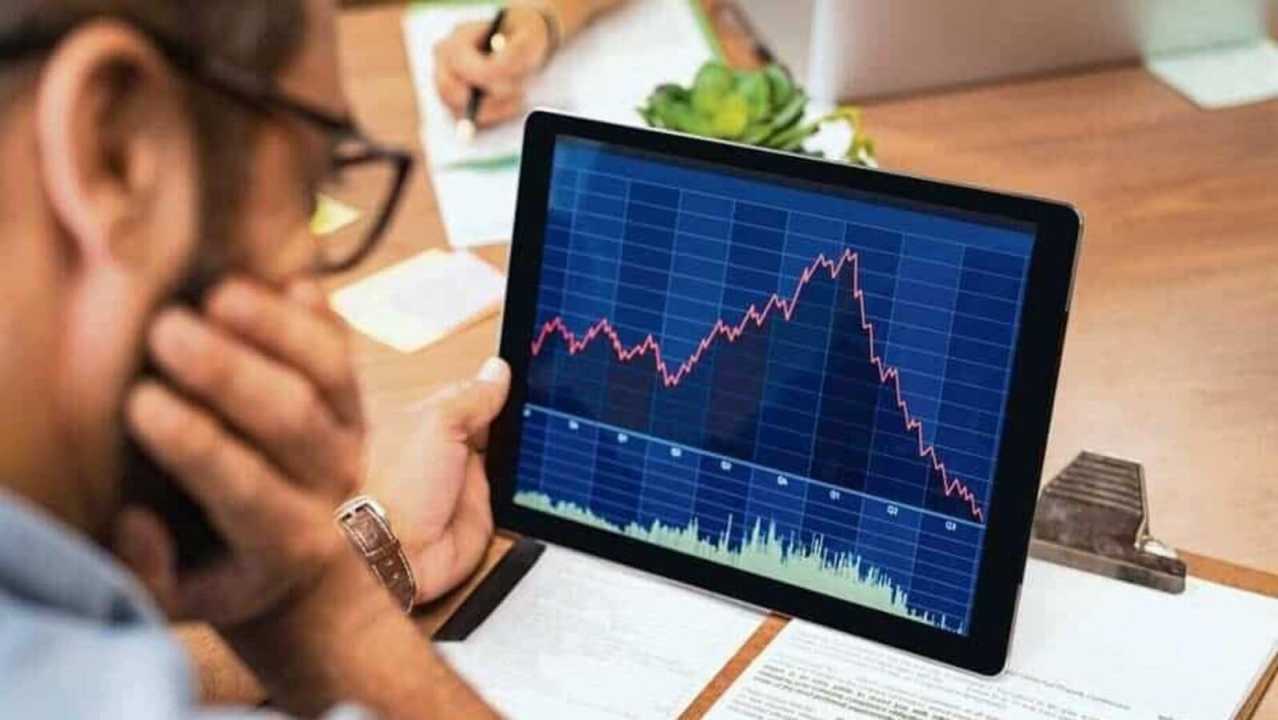 Businessman Checking Stock Market Data