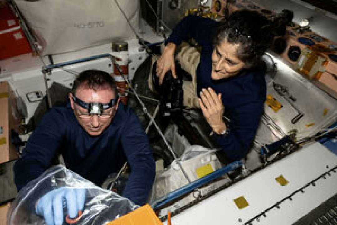 Nasa Astronauts Inspecting Safety Hardware Aboard Iss