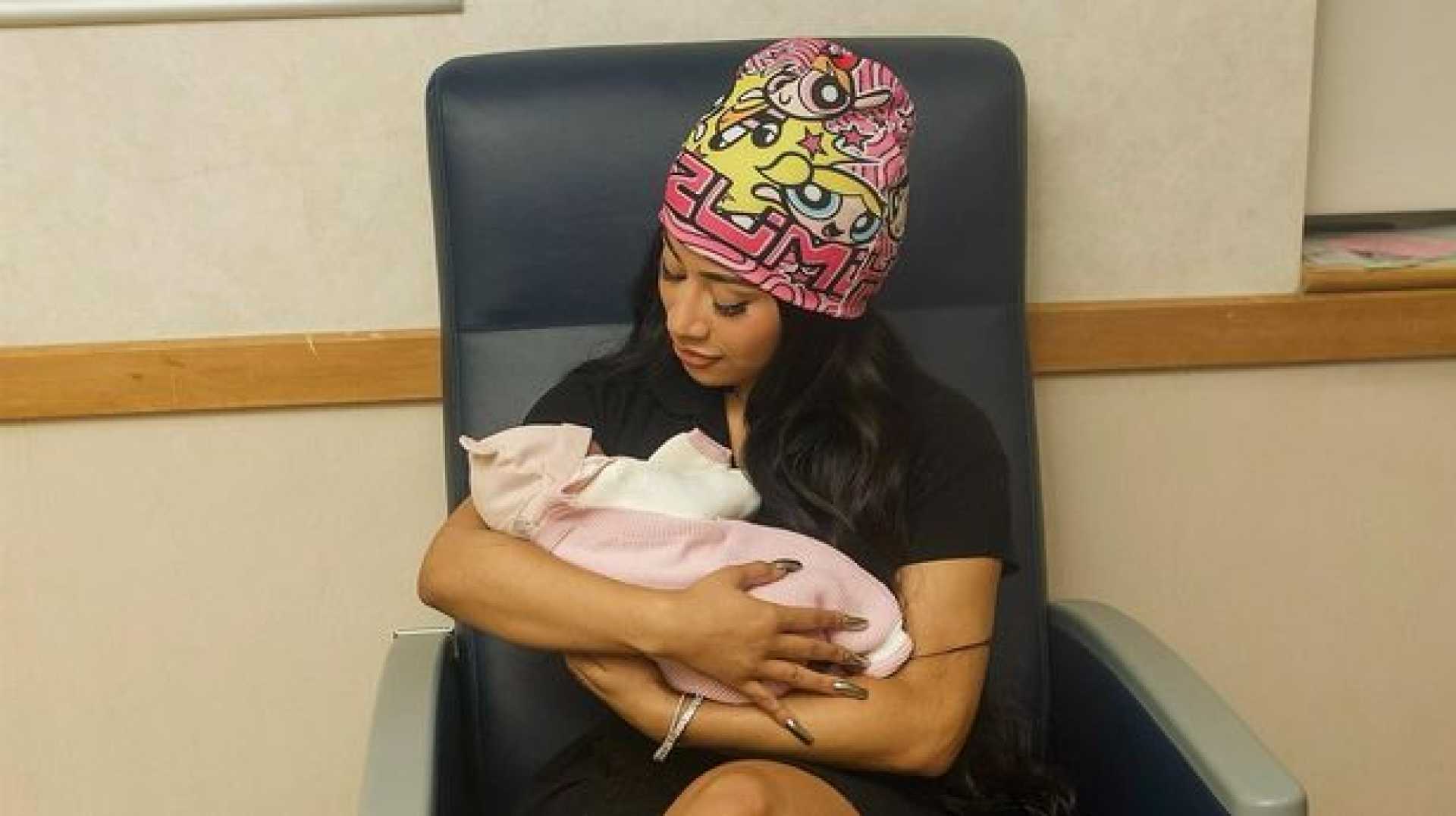 Cardi B Holding Baby