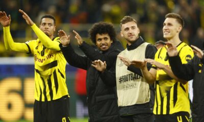 Borussia Dortmund Players Celebrating A Goal