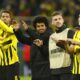 Borussia Dortmund Players Celebrating A Goal