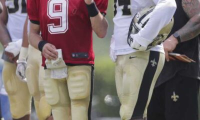 Cam Jordan And Drew Brees On The Field