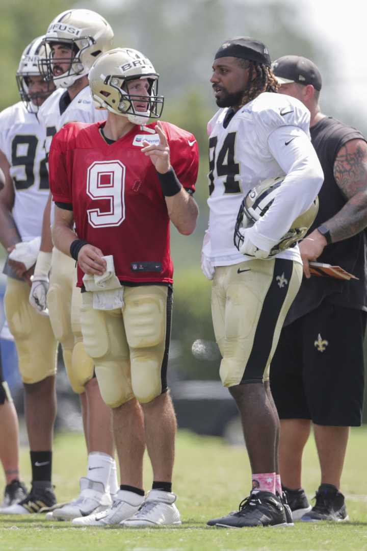 Cam Jordan And Drew Brees On The Field