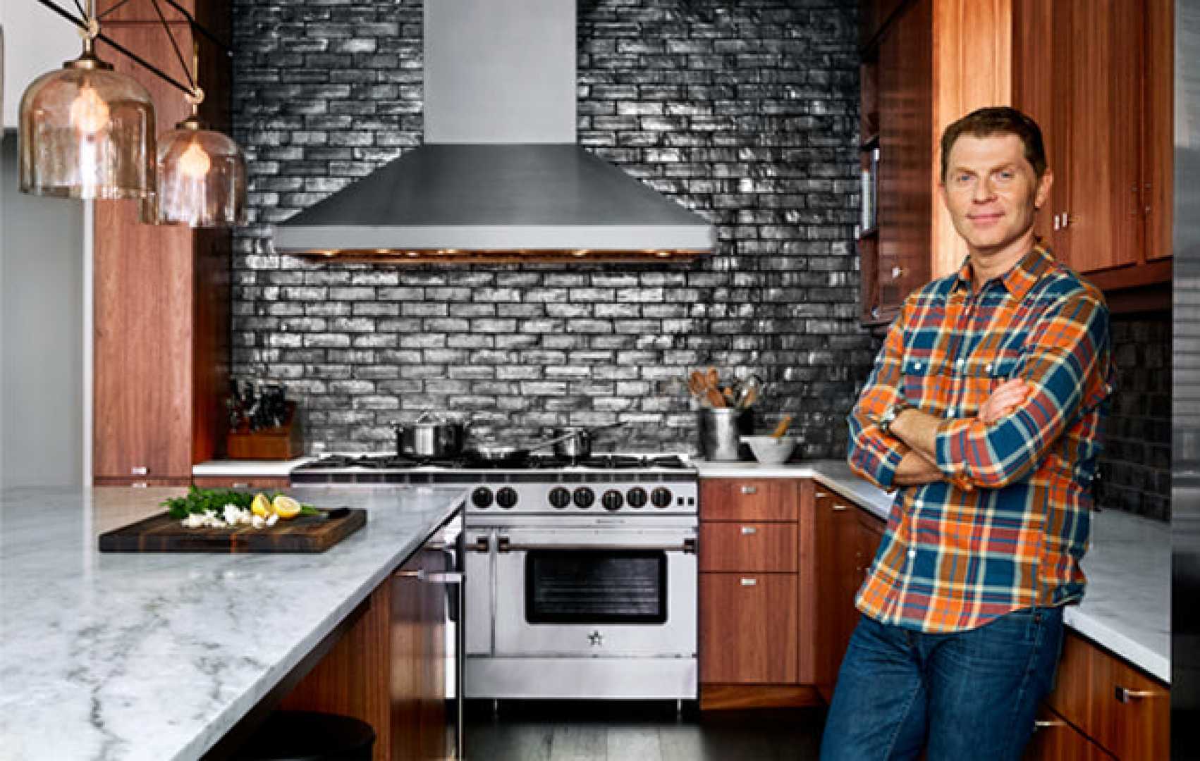 Bobby Flay Cooking Pork Chops With Polenta And Romesco Sauce