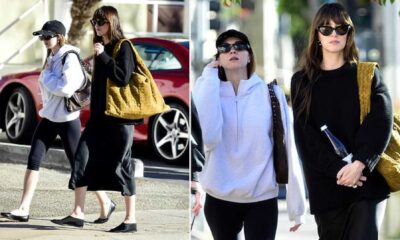 Dakota Johnson In All Black Outfit With Mustard Yellow Tote In Los Angeles