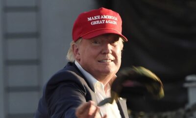 Donald Trump Wearing A Maga Hat