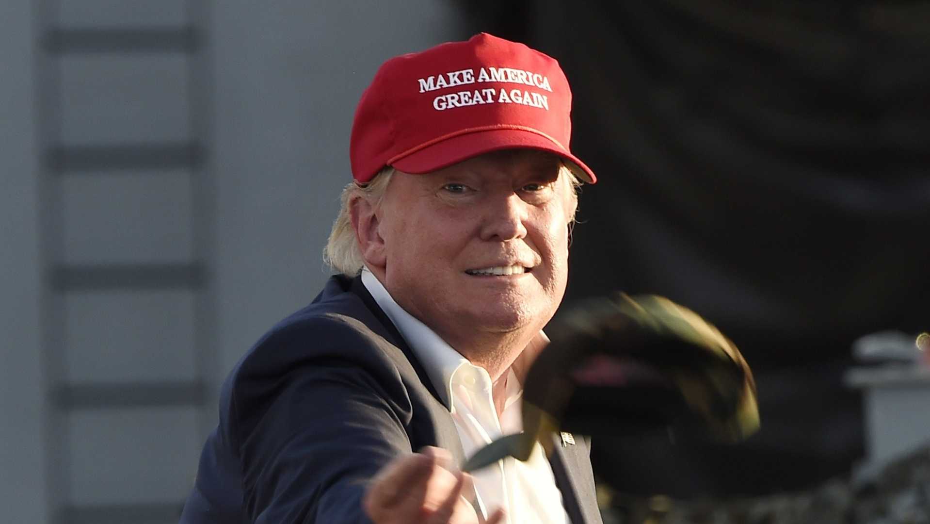 Donald Trump Wearing A Maga Hat