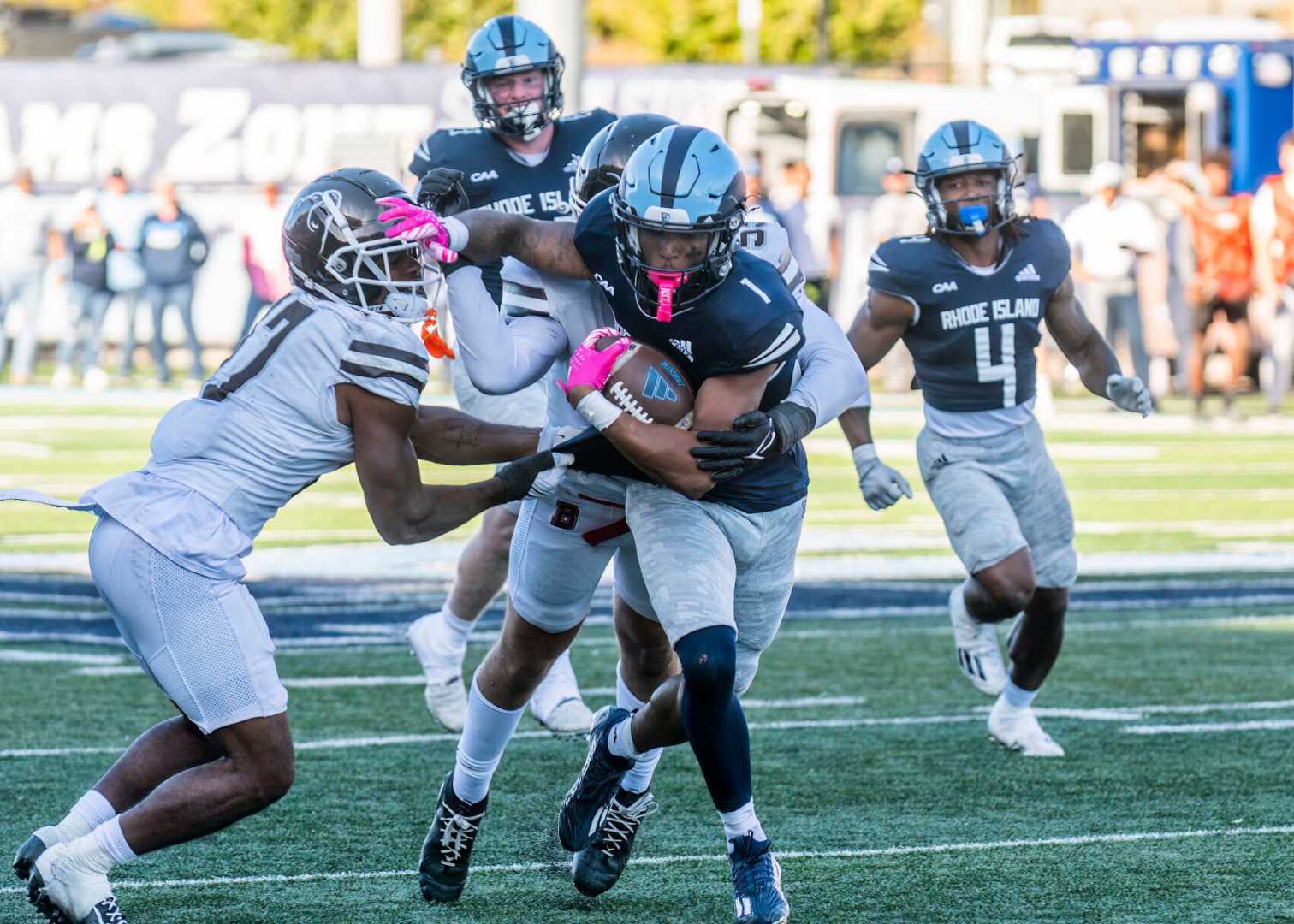 Rhode Island Rams Football Team Celebrating Coastal Athletic Association Title