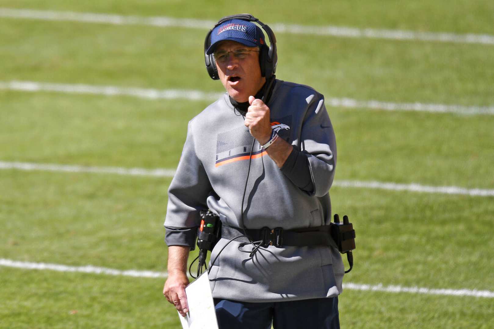 Sean Mcvay And Vic Fangio On The Sidelines During A Football Game