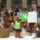 Texas State University Campus Protest And Football Game