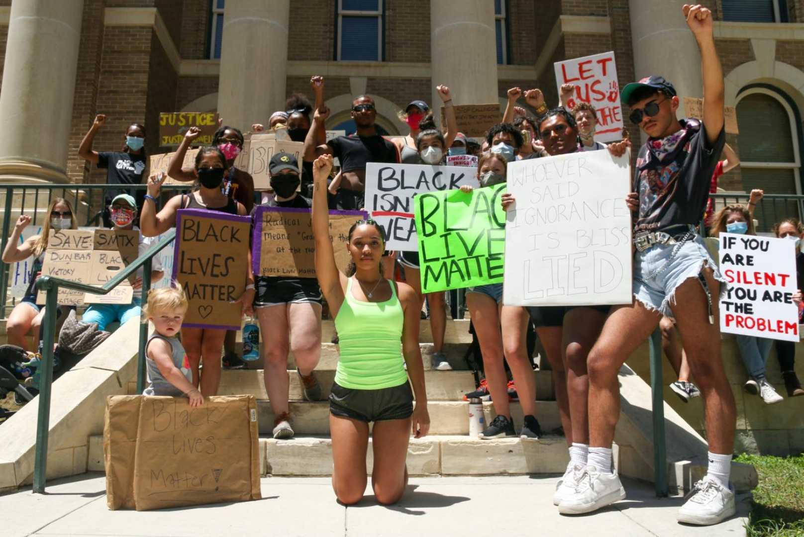 Texas State University Campus Protest And Football Game