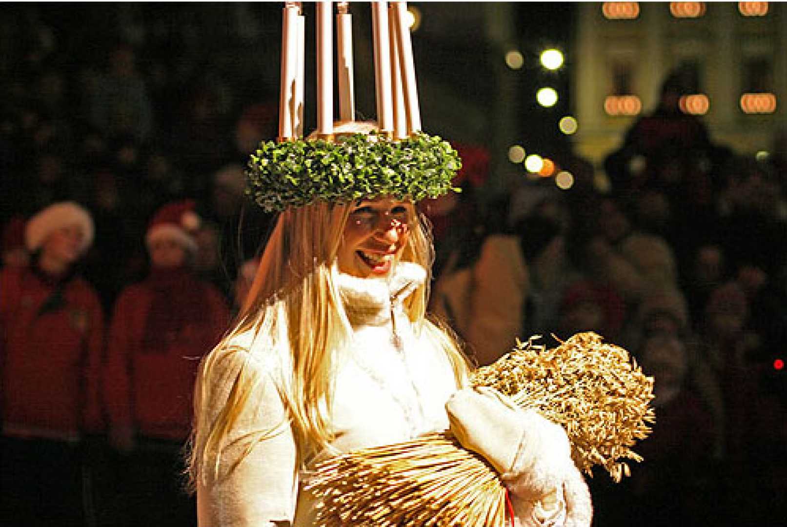 St. Lucia Day Celebrations With Candles And Traditional Attire