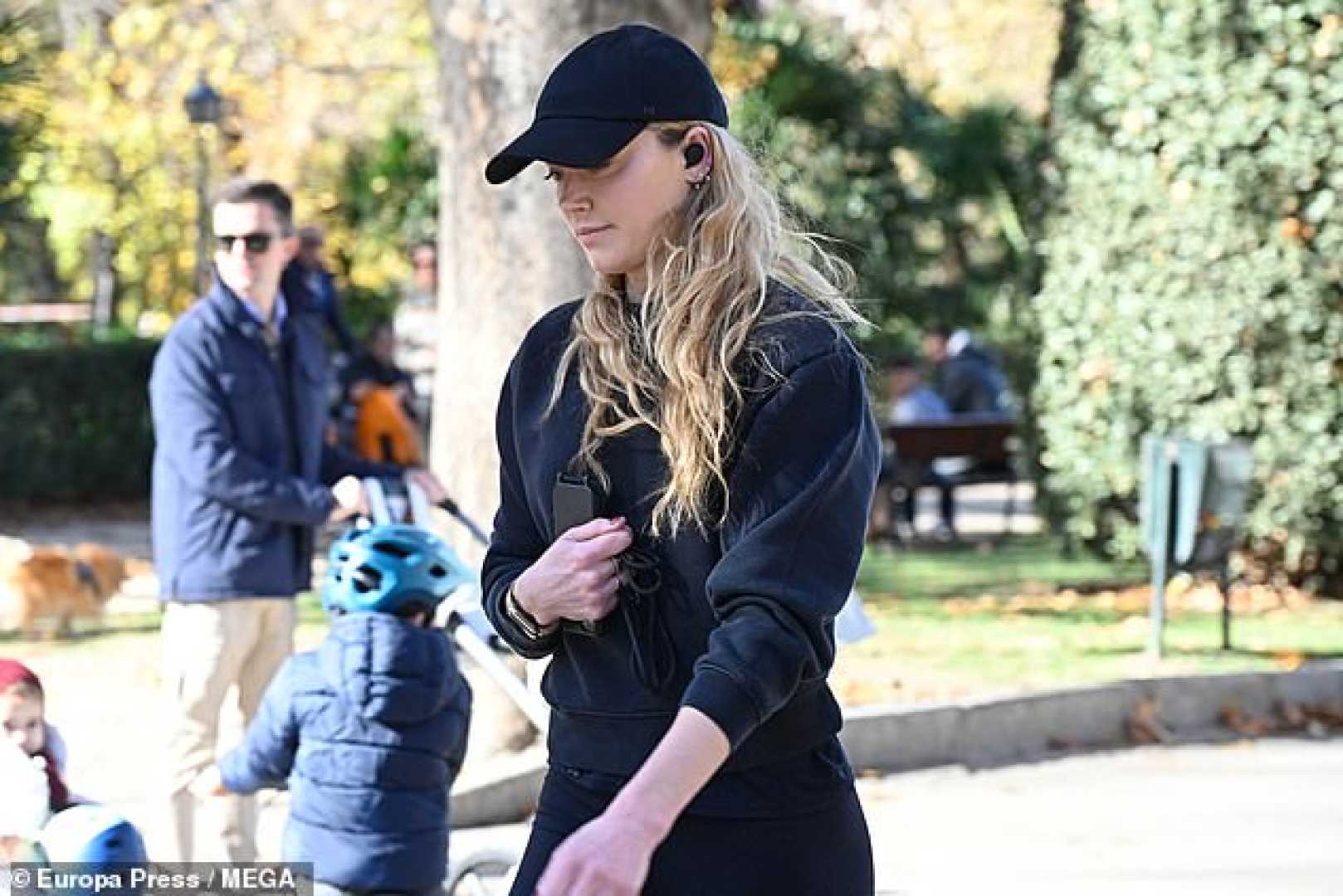 Amber Heard Running In El Retiro Park Madrid