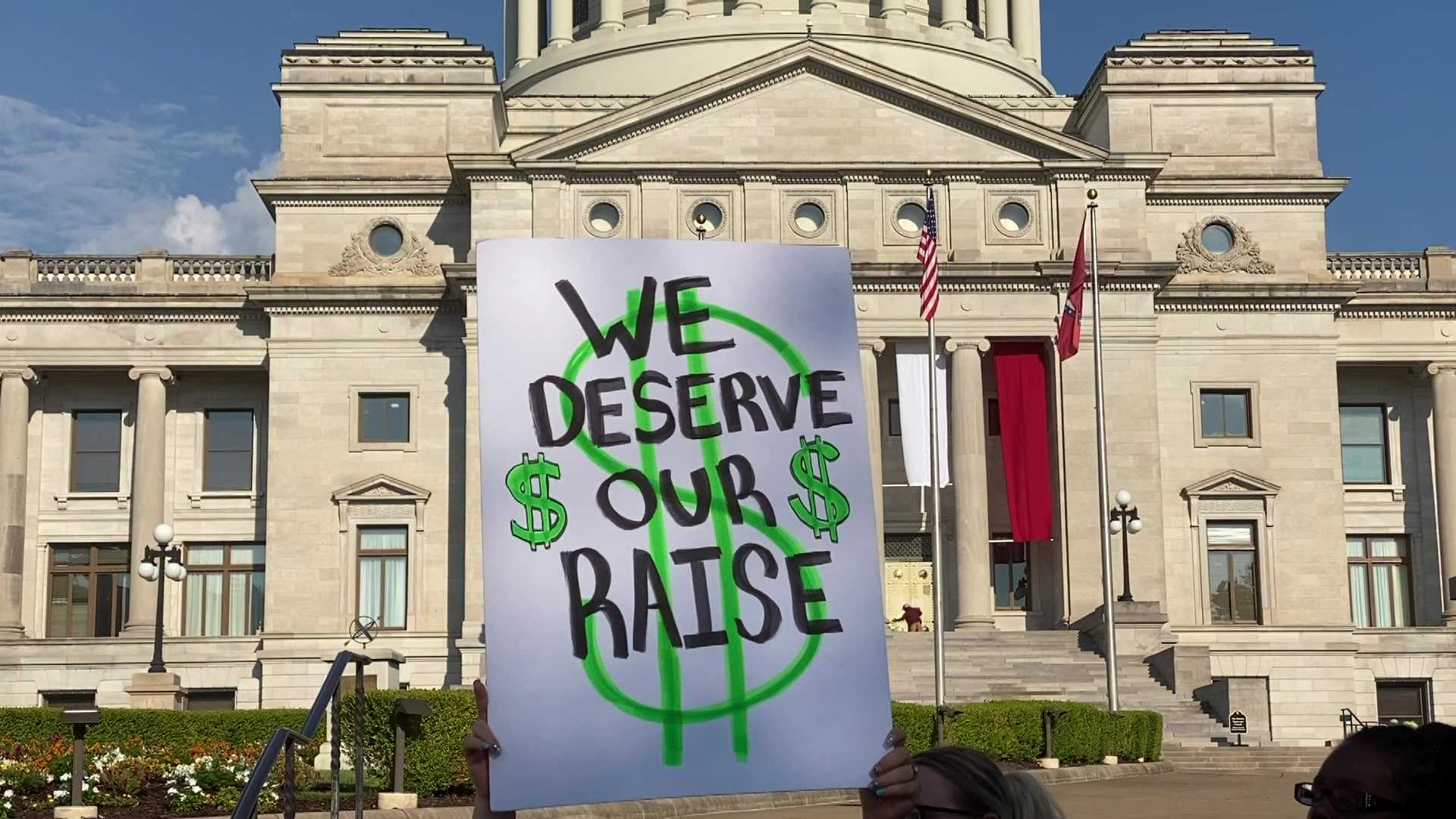 Arkansas State Capitol Building With Protest Signs