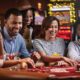 Carnival Cruise Line Game Room With Passengers Playing Cards