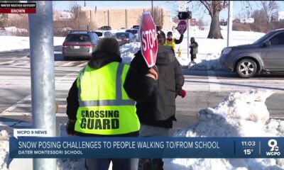 Cincinnati Students Walking In Snow Covered Sidewalks