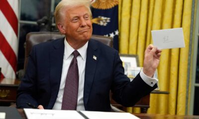 Donald Trump Holding Letter In Oval Office