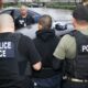 Ice Agents Conducting Immigration Enforcement Operation