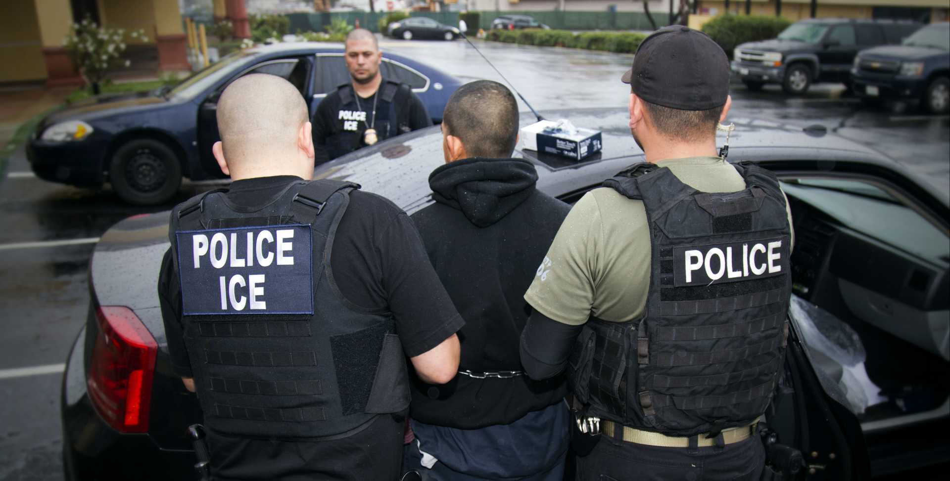 Ice Agents Conducting Immigration Enforcement Operation