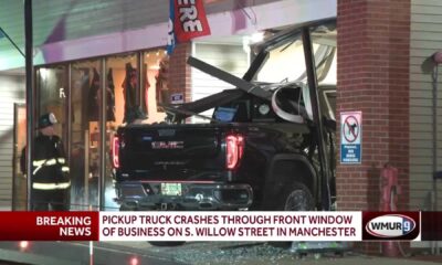 Pickup Truck Crashes Into Manchester Building