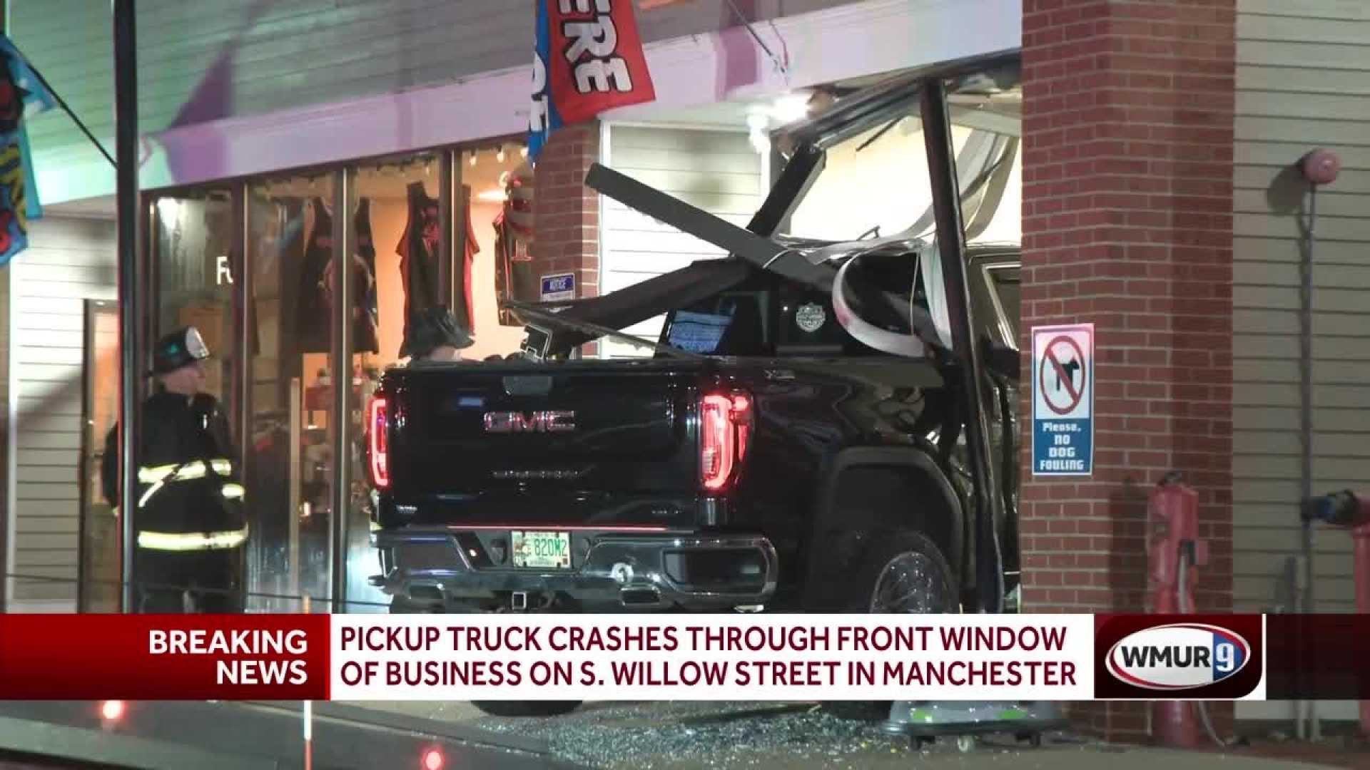 Pickup Truck Crashes Into Manchester Building