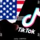 Tiktok App On Smartphone With U.s. Flag Background