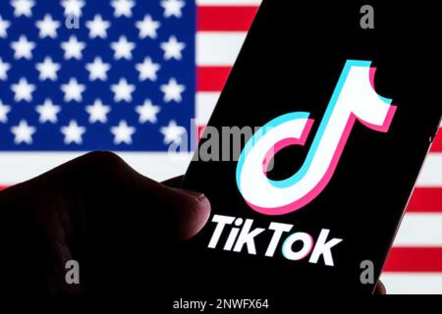 Tiktok App On Smartphone With U.s. Flag Background