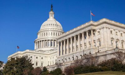 U.s. Capitol Building With Tax Documents