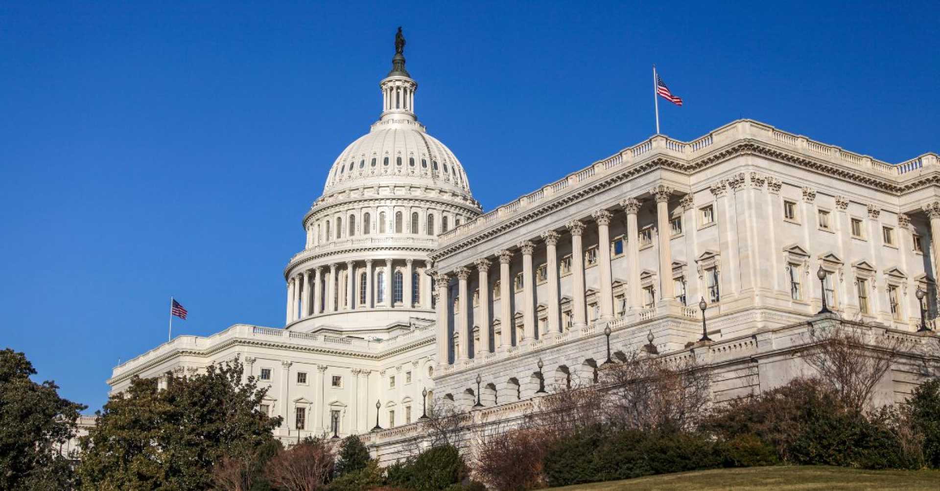 U.s. Capitol Building With Tax Documents