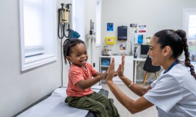 Children Receiving Vaccines In A School Clinic