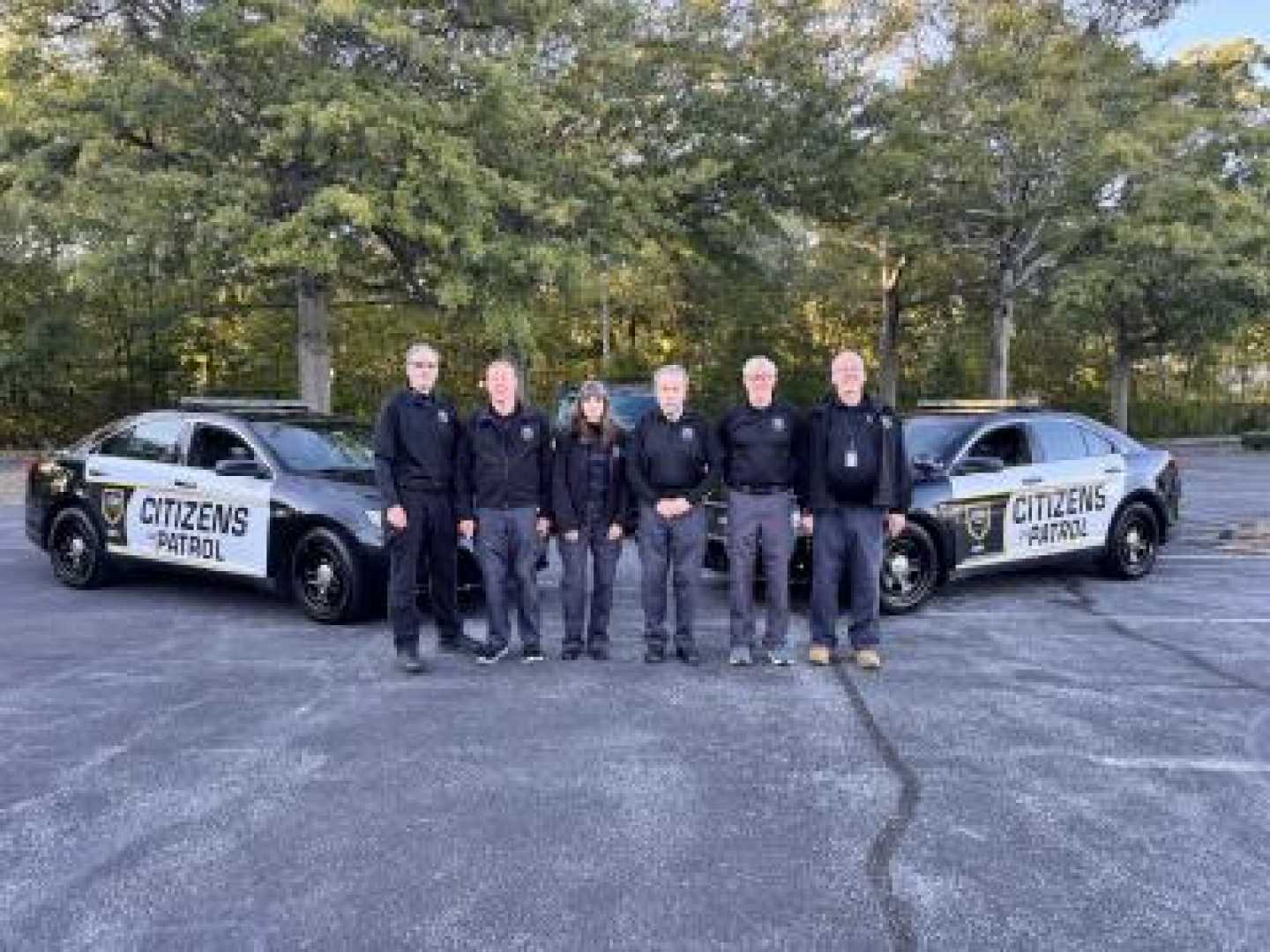 Citizen Police Academy Participants In Patrol Car