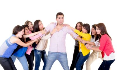 Group Of Four Friends, Two Women, Two Gay Men Hanging Out Together