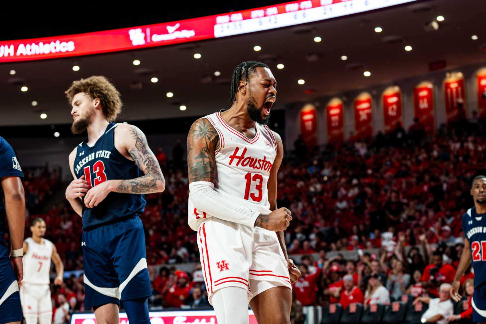 Houston Basketball Players Celebrating Victory