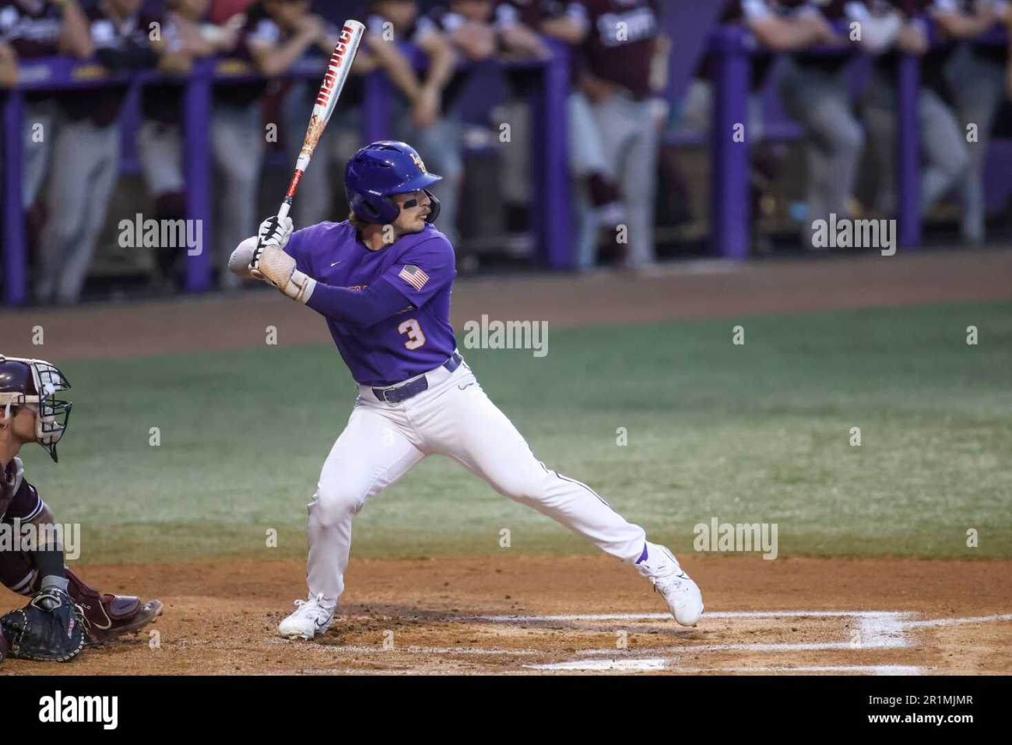 Lsu Baseball Players In Action At Alex Box Stadium