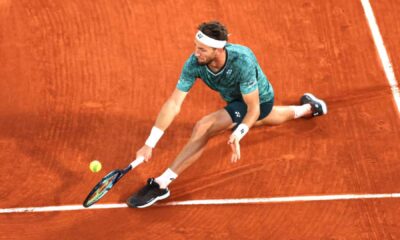 Tennis Player Casper Ruud Playing On Court