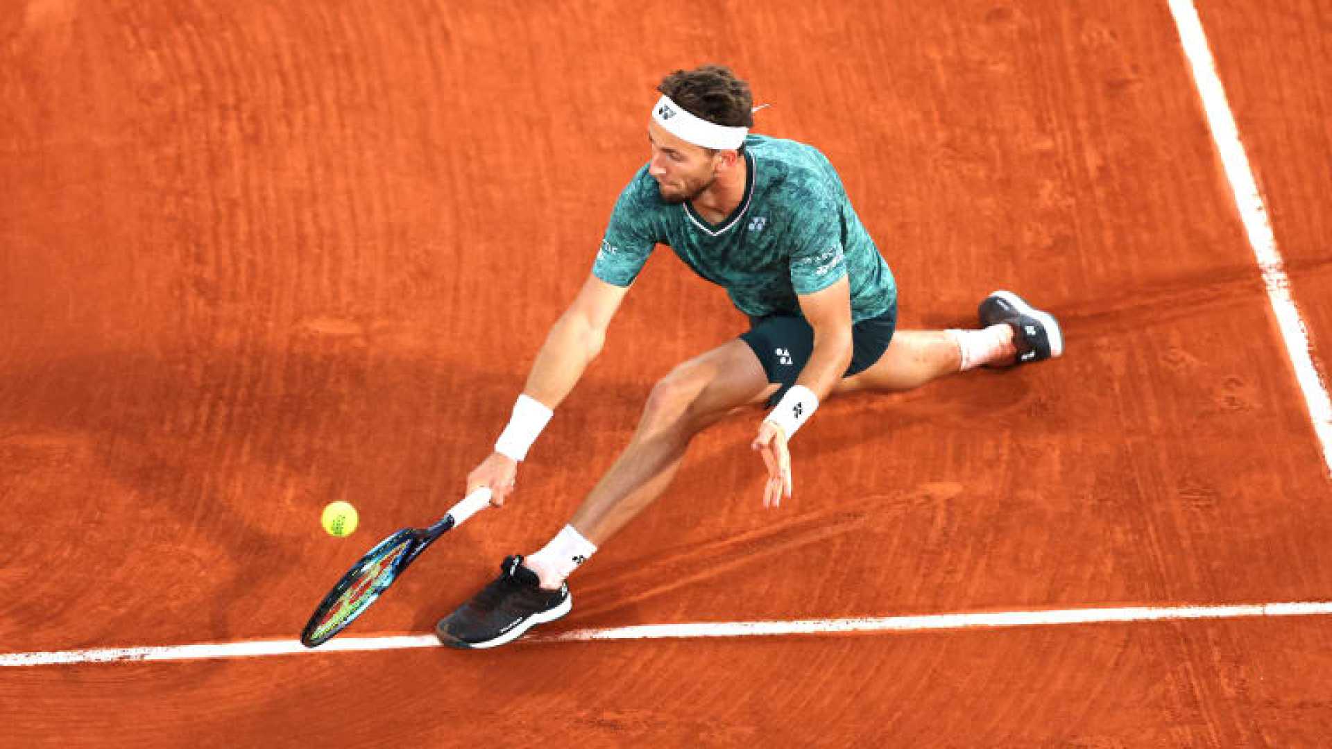 Tennis Player Casper Ruud Playing On Court