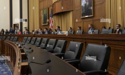 U.s. Capitol Hearing Room With Microphones And Chairs