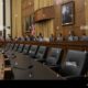 U.s. Capitol Hearing Room With Microphones And Chairs