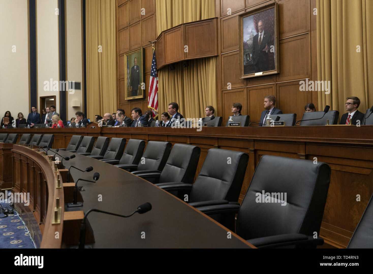 U.s. Capitol Hearing Room With Microphones And Chairs